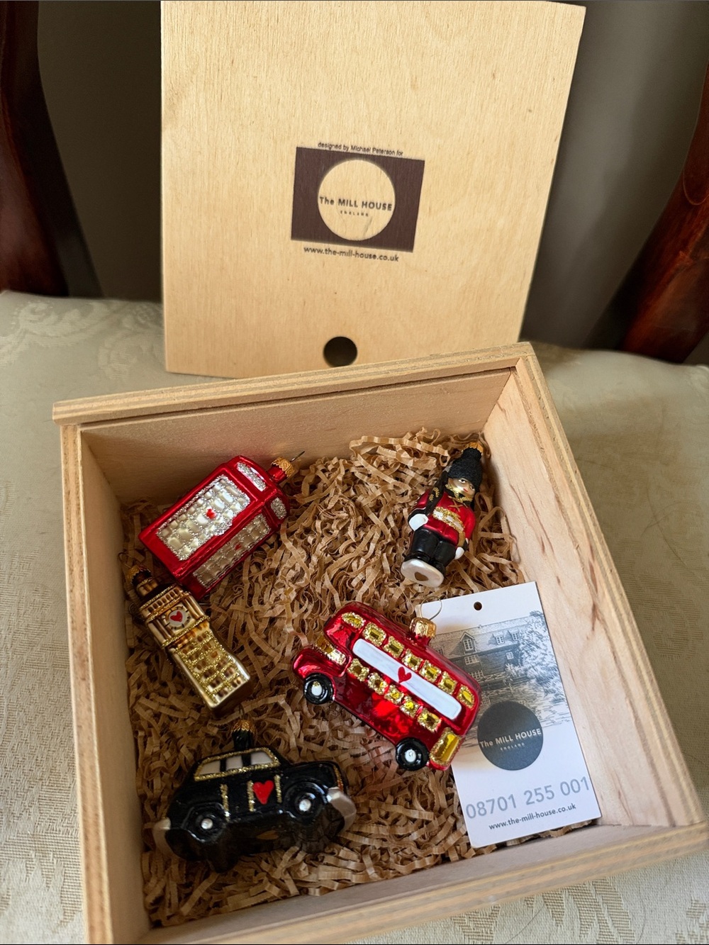 The Mill House England wood box of 5 glass ornaments by Michael Peterson